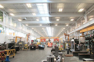 painting a metal ceiling in a Flint MI factory