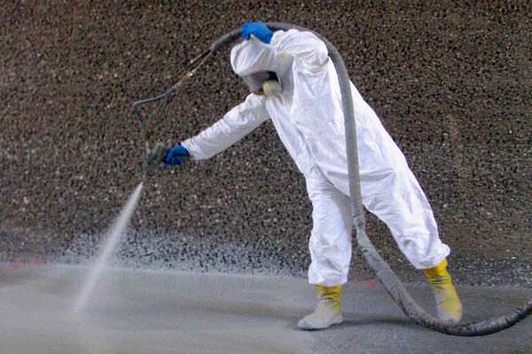 commercial/industrial painter spray painting