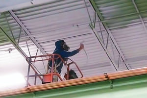 painting a metal ceiling by a Warren, MI industrial painter