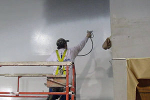 spray painting of a wall by an industrial painter in Cleveland, Ohio